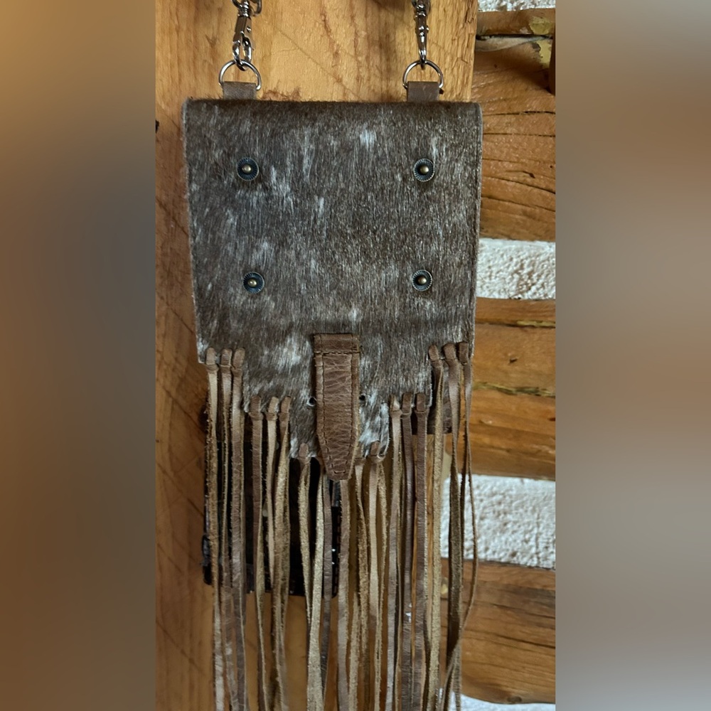 Pure Dixie cowhide crossbody/mini handbag with fringe